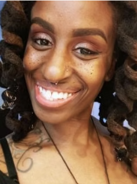 Portrait of Derytah Tomara, founder of Divine Textures